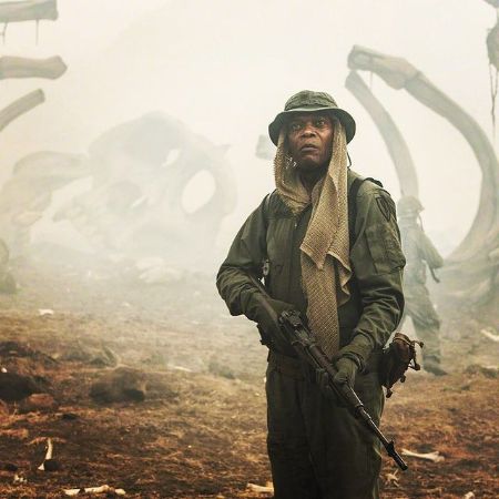 Samuel L. Jackson holding a rifle